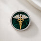 The Prestige Doctor Diamond Brooch in 925 Silver with Green Enamel and Yellow Finish