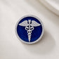 The Prestige Doctor Diamond Brooch in 925 Silver with Blue Enamel and White Finish