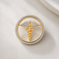 The Sovereign Doctor Single Line Skeleton Diamond Brooch in 925 Silver with Yellow Finish