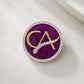 The Laureate CA Diamond Brooch in 925 Silver with Plum Enamel